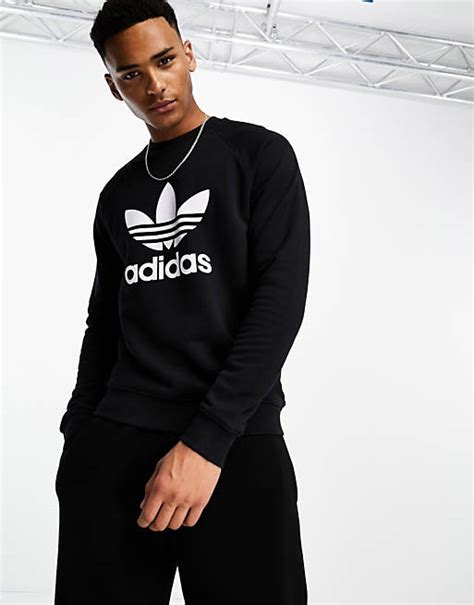 adidas pulli schwarz mit großem logo|adidas Originals Plus – Sweatshirt mit großem Logo in Schwarz.